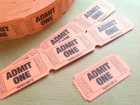 A photo of “admit one” tickets.