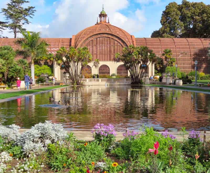front view of the botanical garden building and lily pond