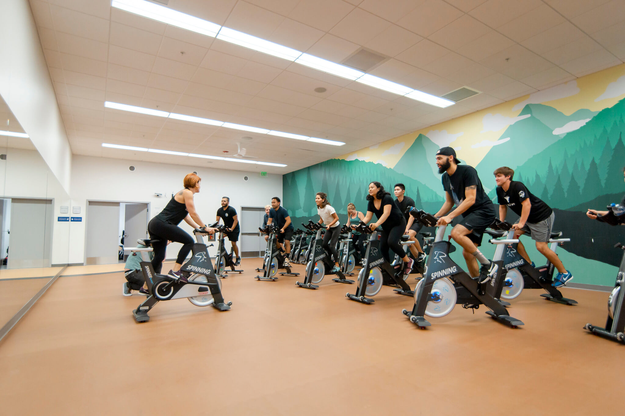 Students participating in a spin class