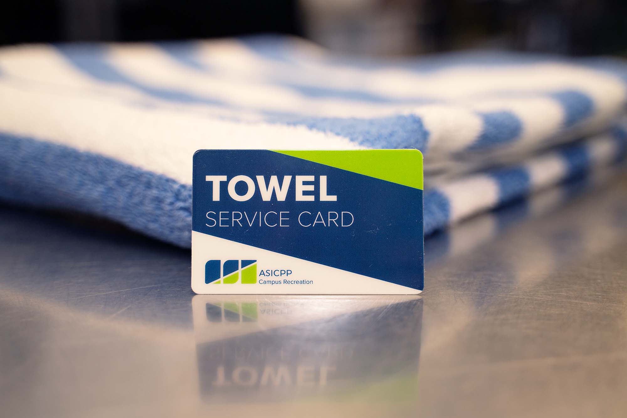 Towel Service Card with a shower towel folded behind